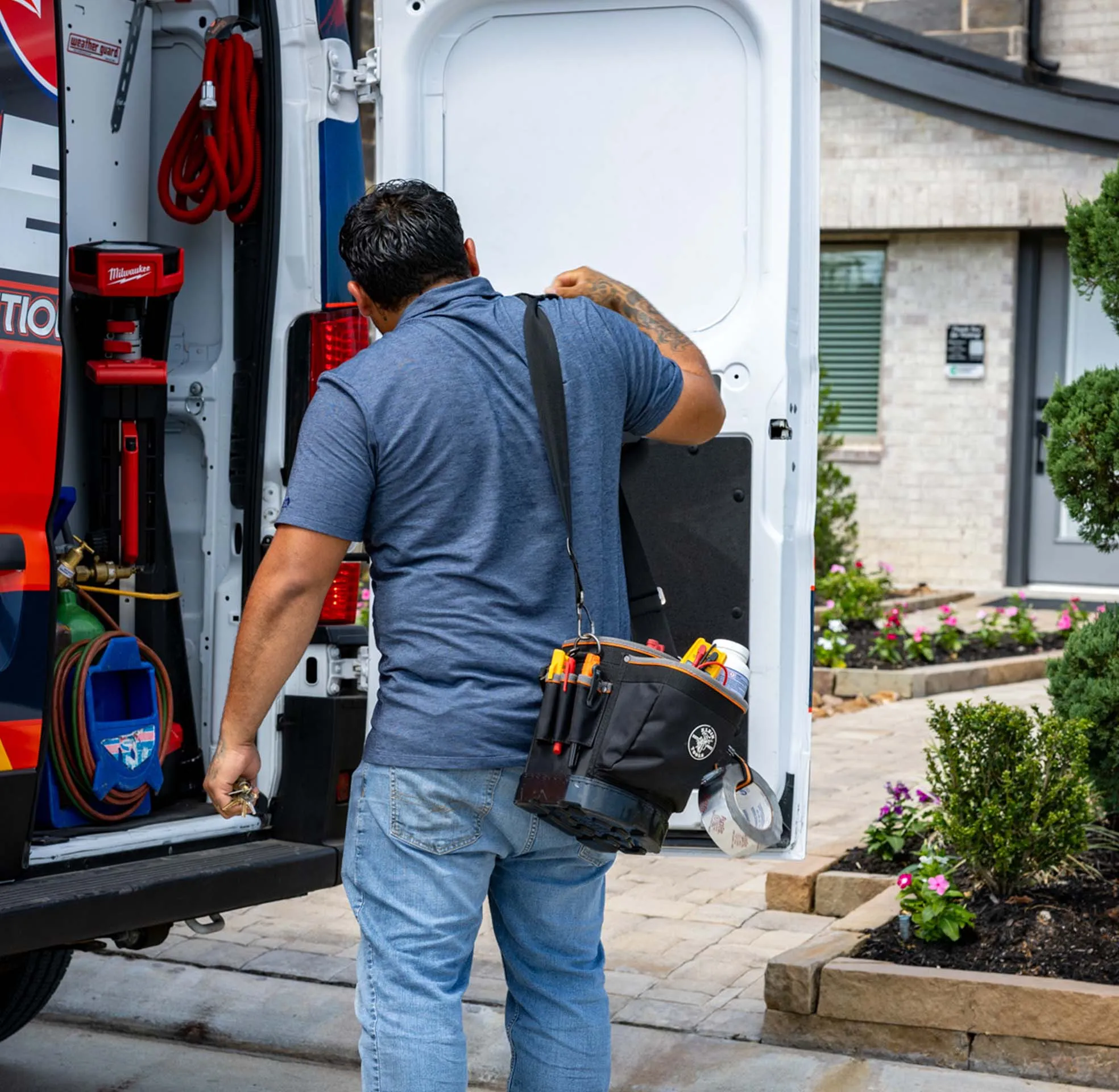 Tech getting out of van