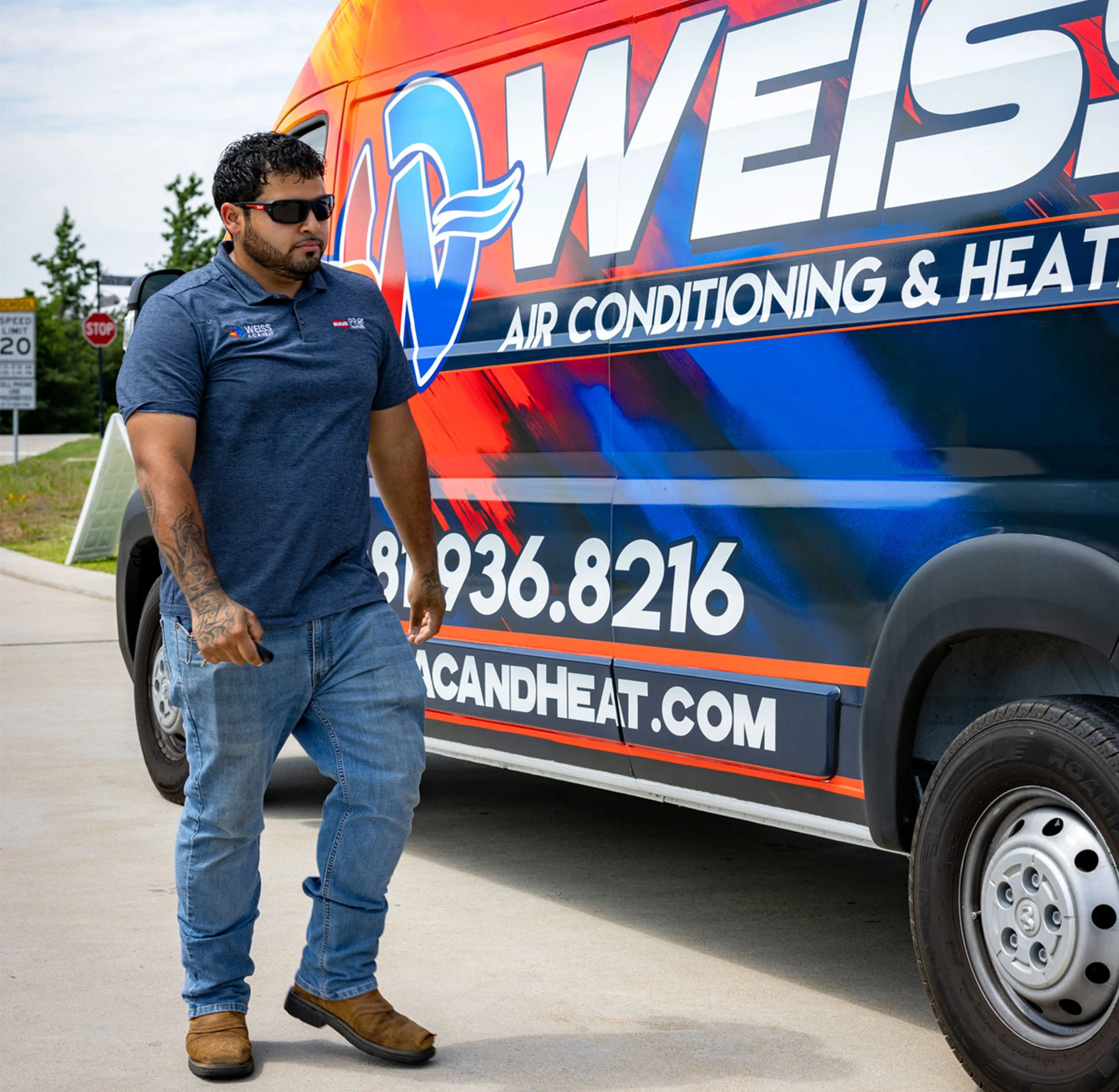 Tech walking outside of van