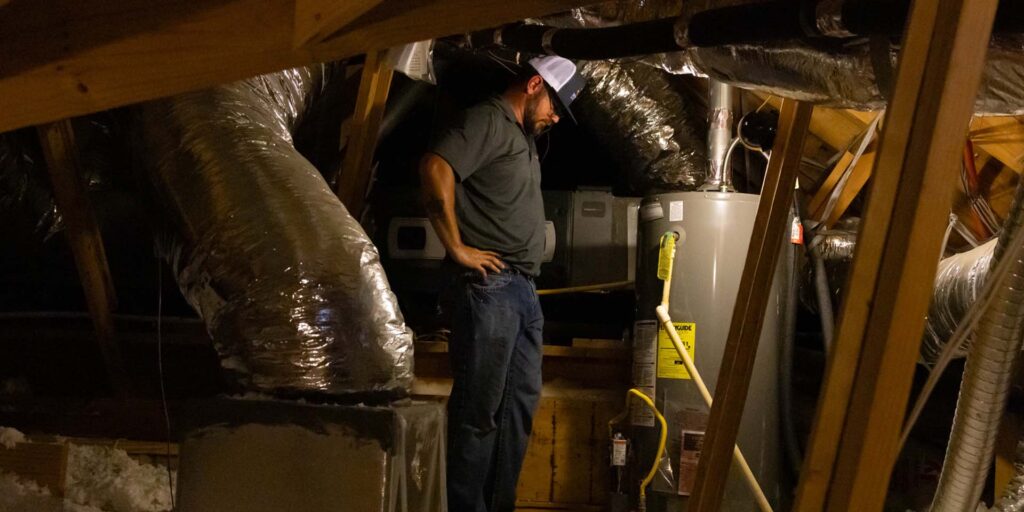 Weiss tech working in attic