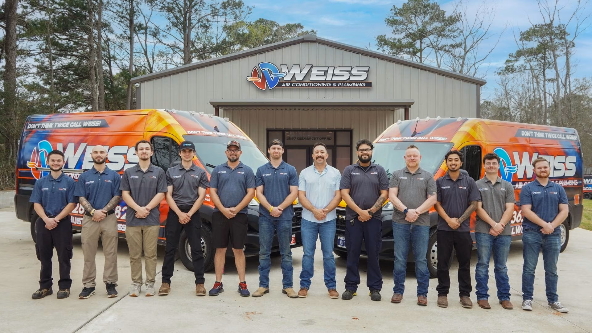 weiss ac and plumbing technicians and owner standing in front of their building in Montgomery County