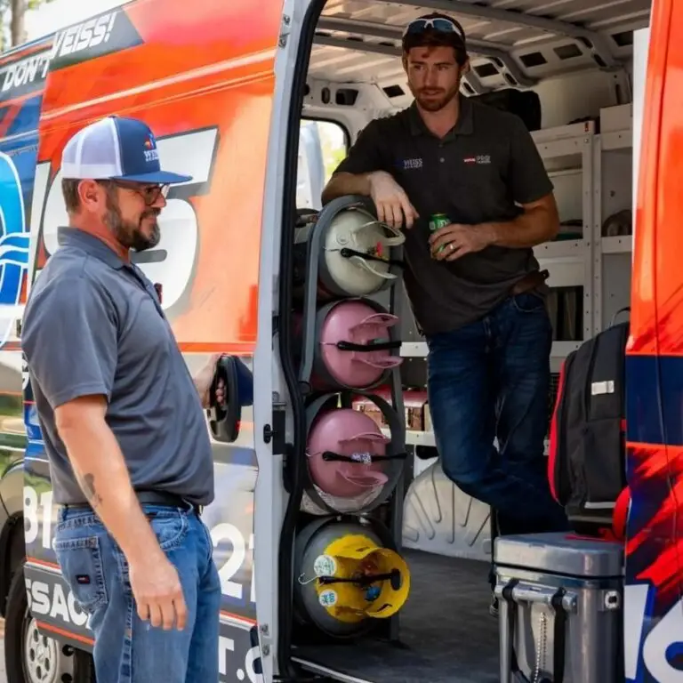 Weiss Air Conditioning and Plumbing HVAC Techs in ac repair van in the Woodlands Texas