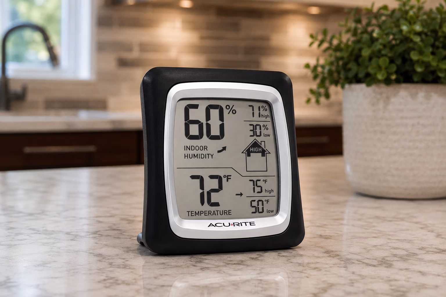 Digital humidity gauge showing high indoor humidity levels in a Conroe, TX home with the AC running.